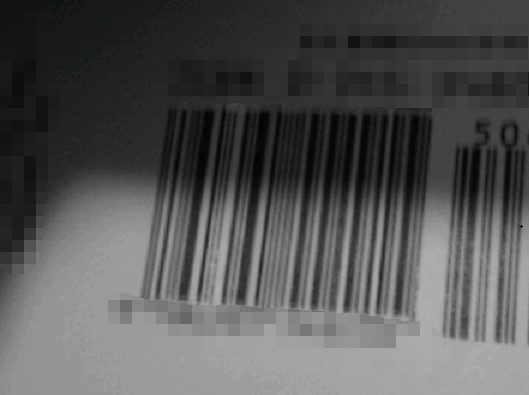 Sample barcode image with uneven lighting