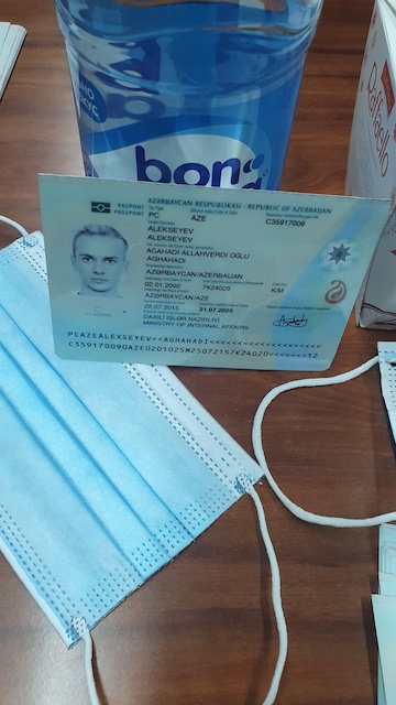 MIDV-2020 sample image (photographed passport MRZ)