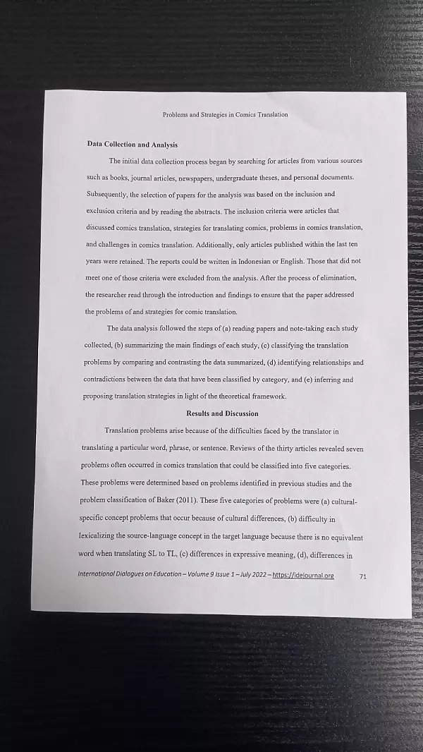 A4 document on a dark background