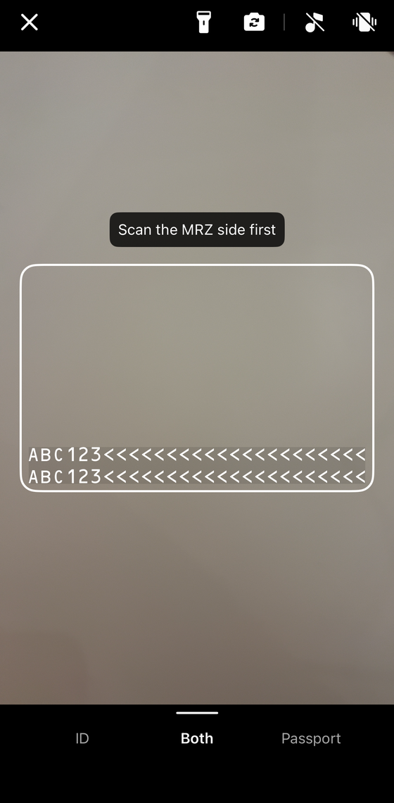 The MRZ Scanner screen waiting for a document, showing the guide frame and the prompt to scan the MRZ side first